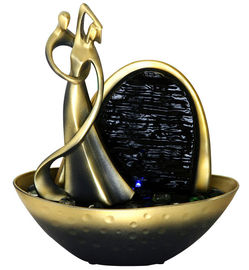 China Goldene Farbdekorative Tischplatte-Wasser-Brunnen in der Tänzer-Form fournisseur